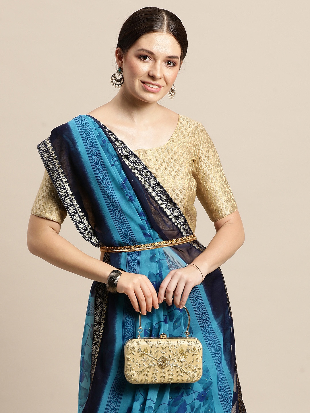 

Triveni Blue Floral Printed Beads and Stones Pure Chiffon Saree