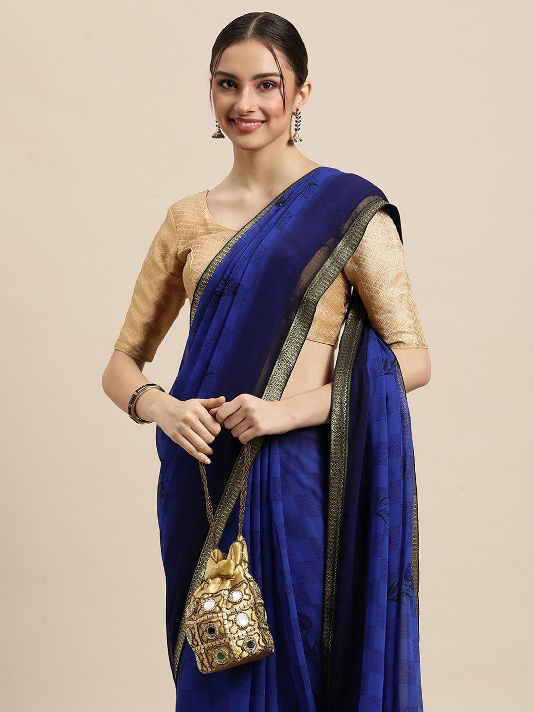 

Triveni Blue Ethnic Motifs Pure Georgette Saree