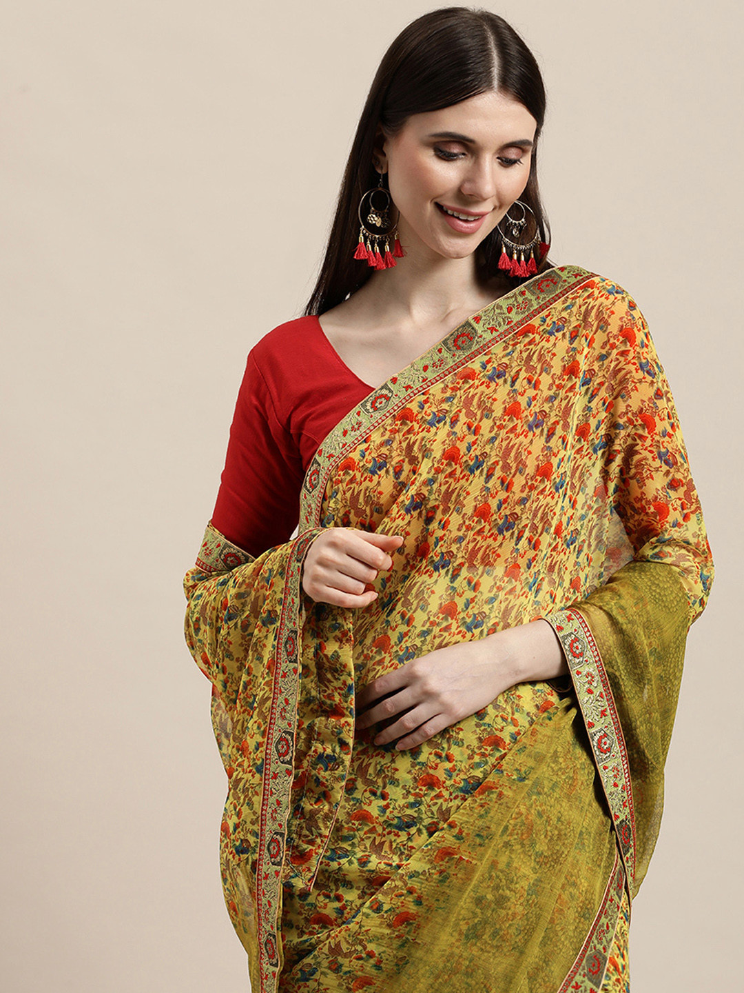 

Triveni Yellow & Orange Floral Pure Chiffon Saree