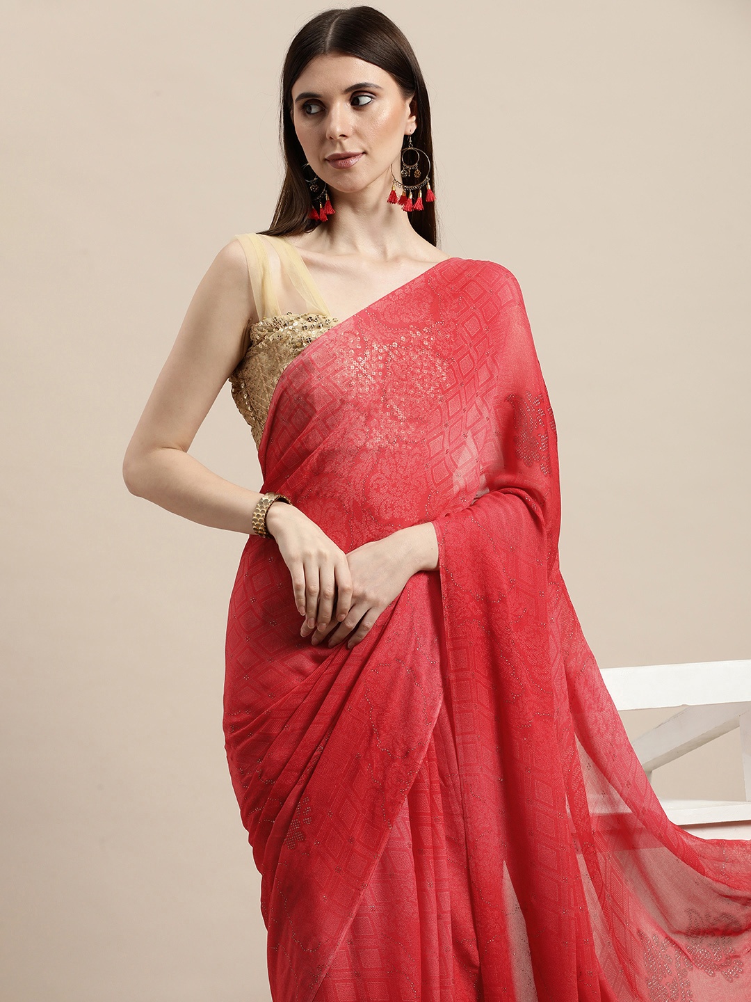 

Triveni Red & Gold Ethnic Motifs Zari Tasseled Celebrity Saree