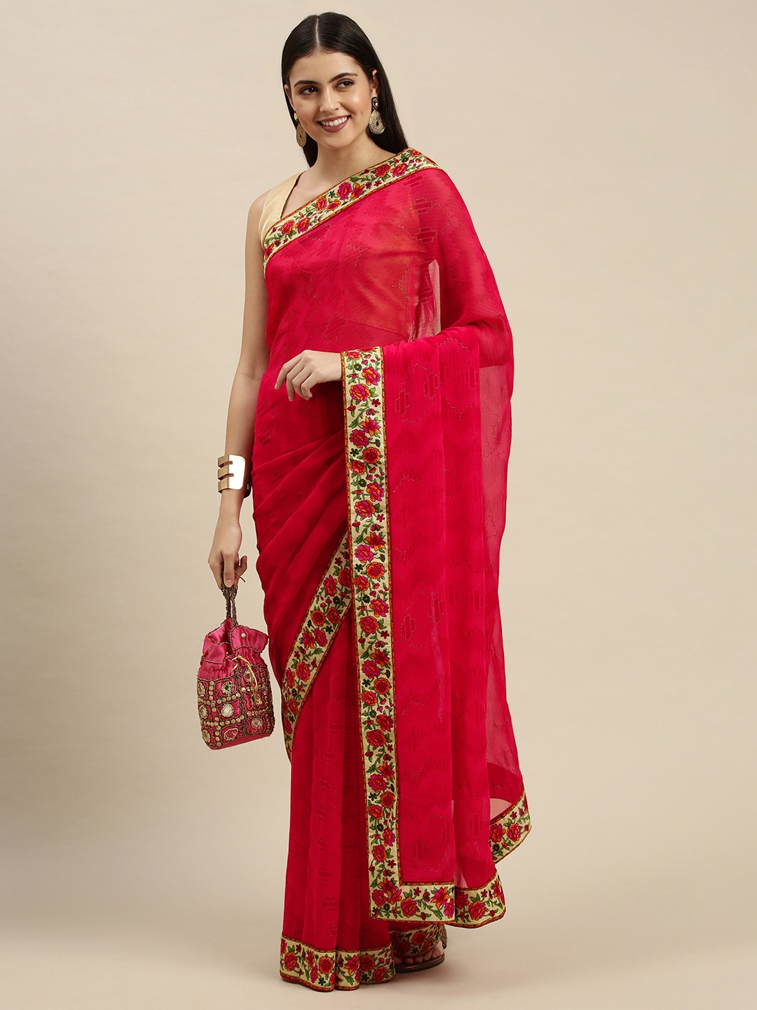 

Triveni Red Floral Zari Pure Georgette Saree