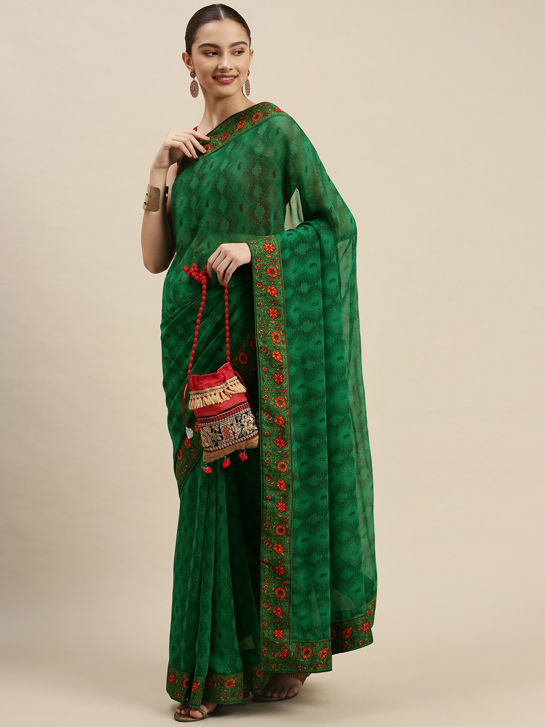 

Triveni Green & Orange Paisley Print Zari Pure Georgette Saree