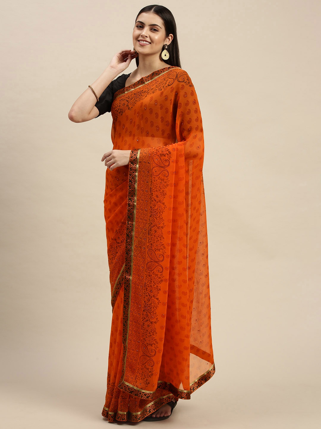 

Triveni Orange Paisley Pure Chiffon Saree