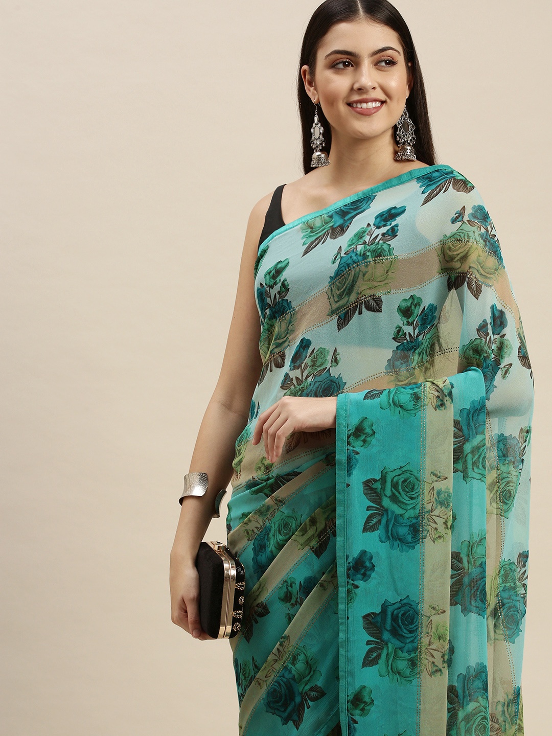 

Triveni Sea Green & Grey Floral Print Zari Pure Georgette Saree