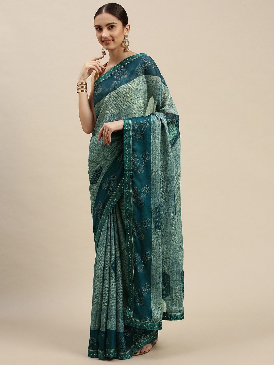 

Triveni Blue & Sea Green Floral Print Stone Embellished Saree
