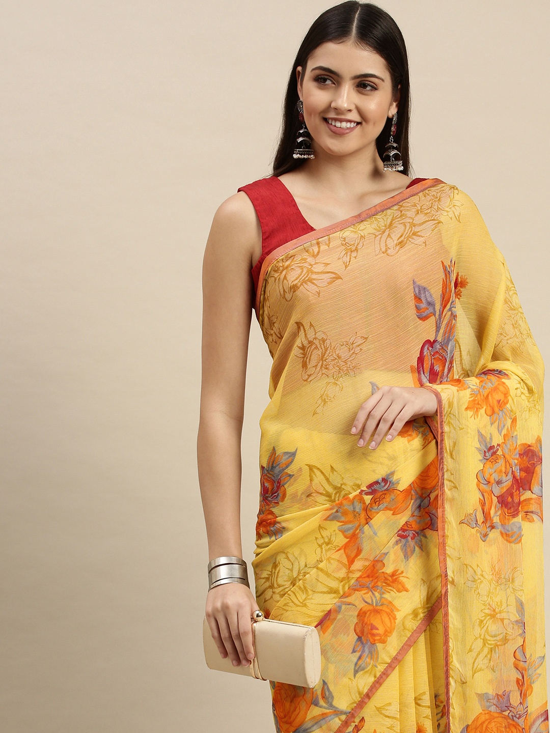 

Triveni Mustard Yellow & Red Floral Pure Chiffon Saree