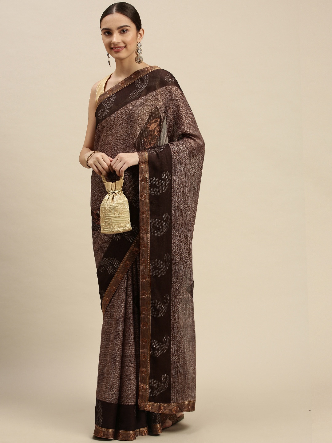 

Triveni Brown Paisley Printed Beads and Stones Embellished Saree