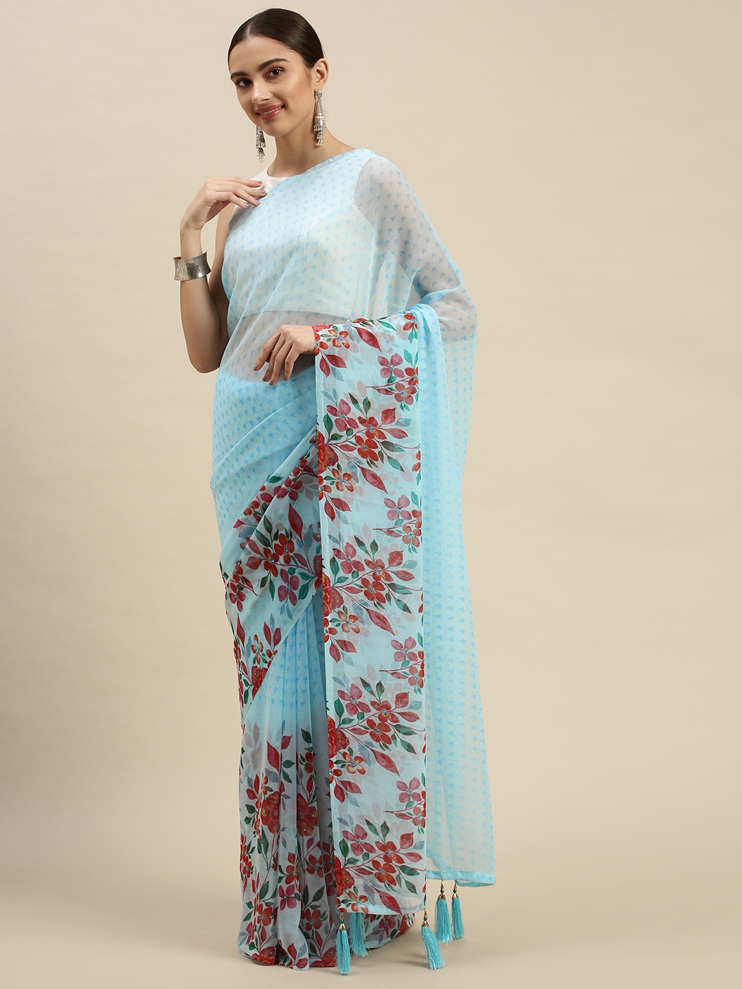 

Triveni Blue & Red Floral Beads and Stones Pure Chiffon Saree