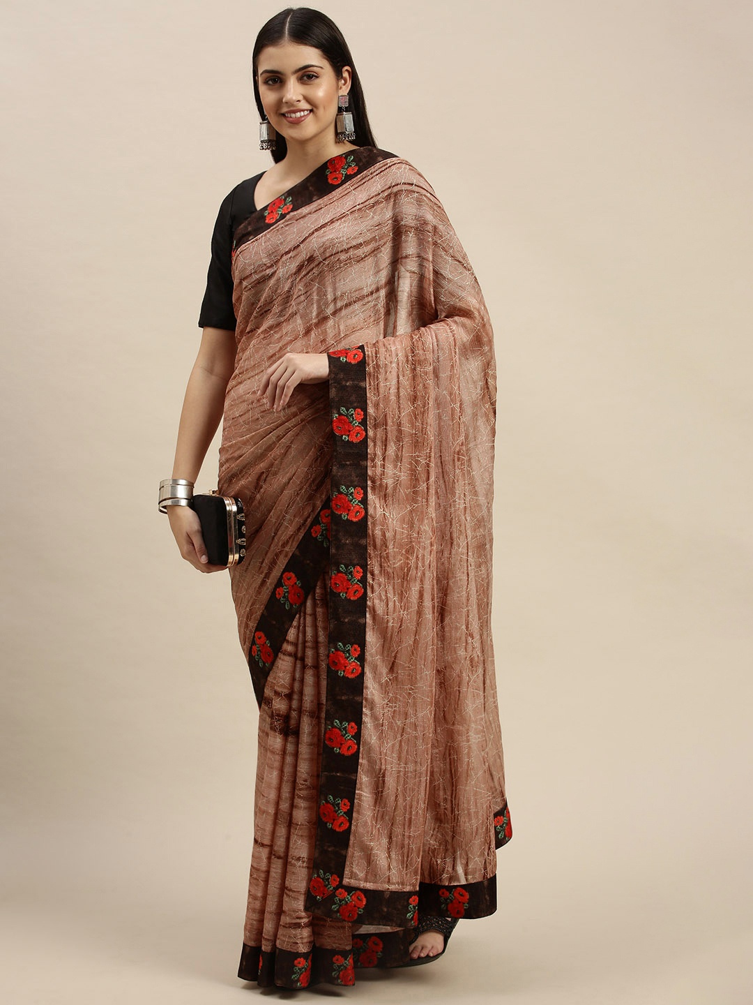 

Triveni Brown Floral Zari Saree
