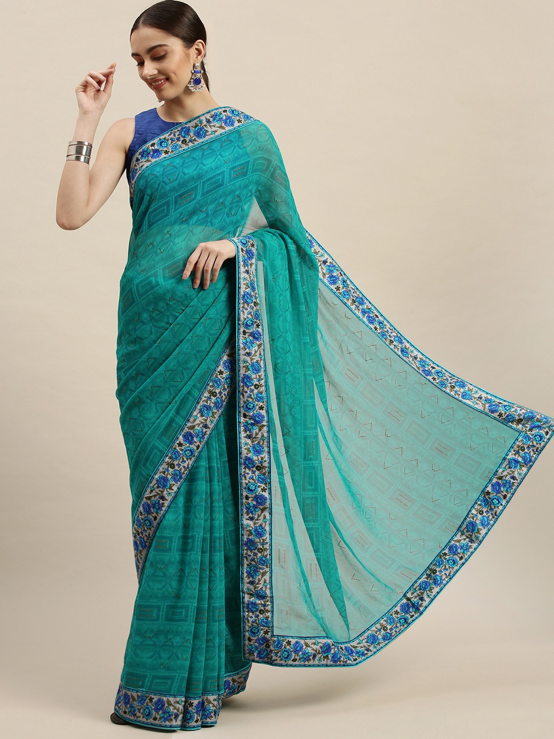 

Triveni Blue & Green Geometric Print Zari Pure Georgette Saree