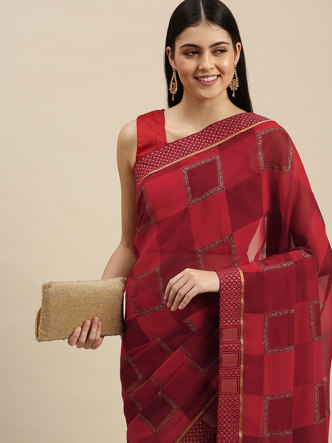 

Triveni Red Geometric Beads and Stones Pure Georgette Saree