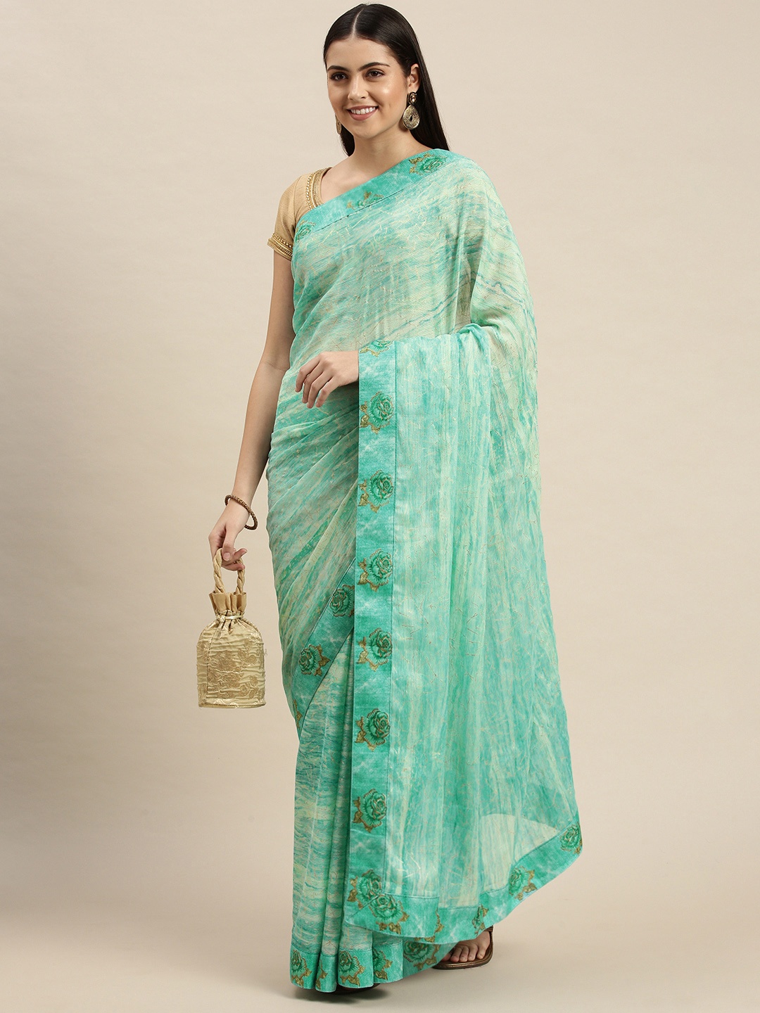 

Triveni Turquoise Blue Abstract Print Saree