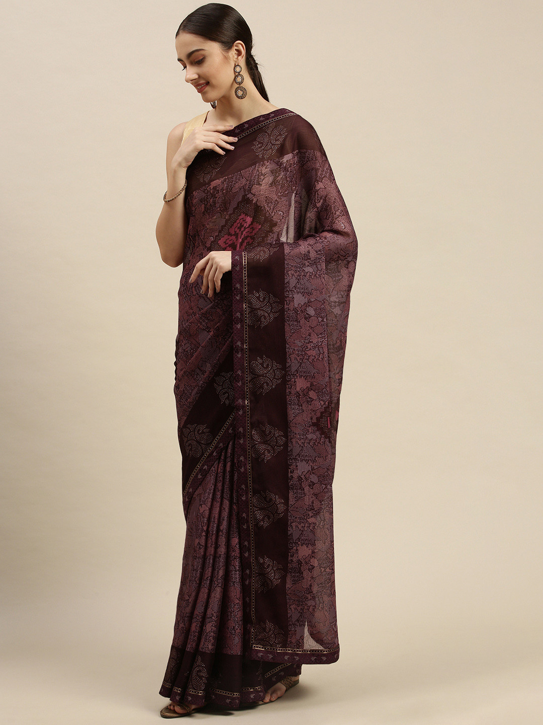 

Triveni Burgundy Geometric Print Saree