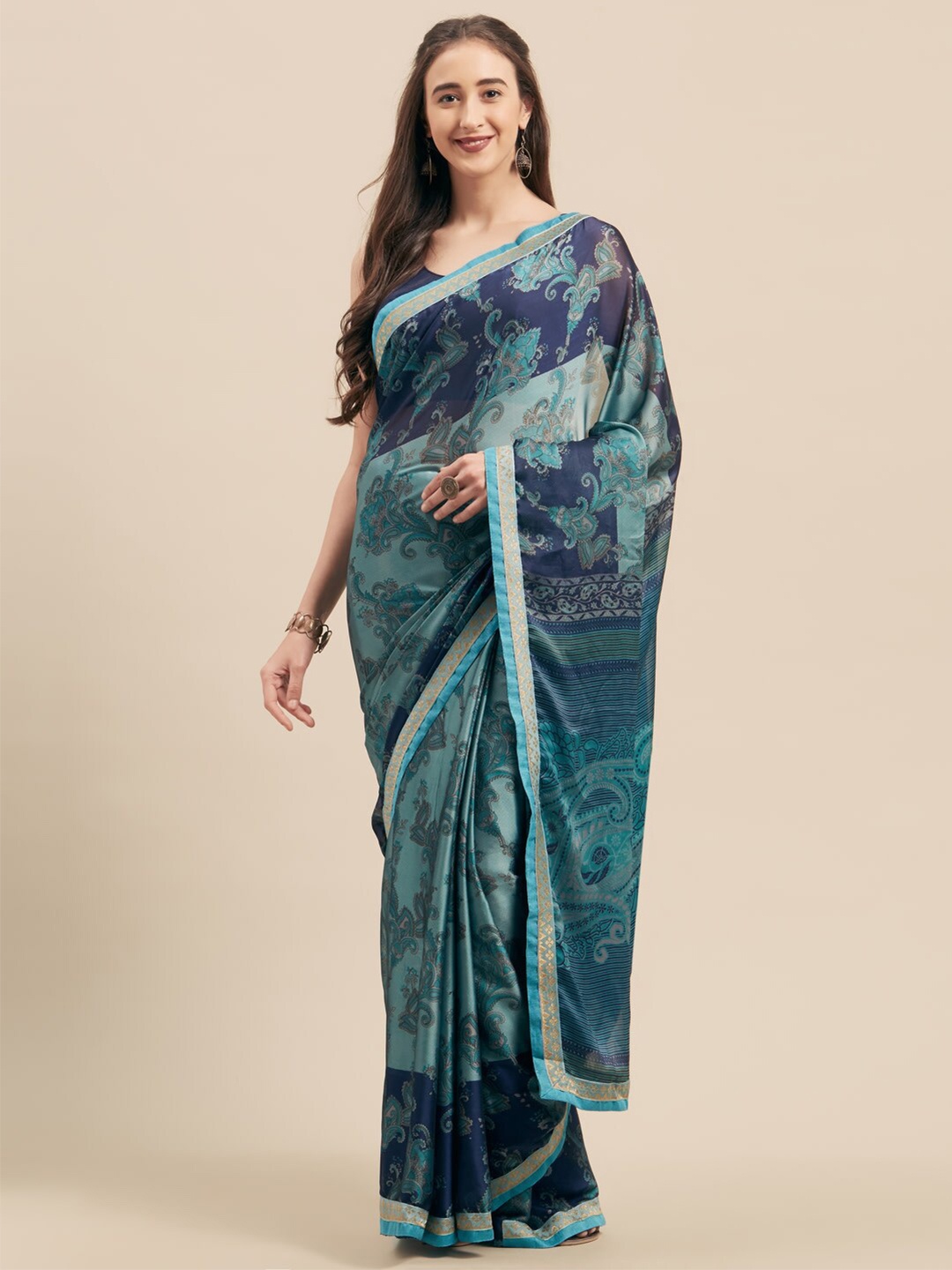

Shaily Sea Green & Blue Ethnic Motifs Saree