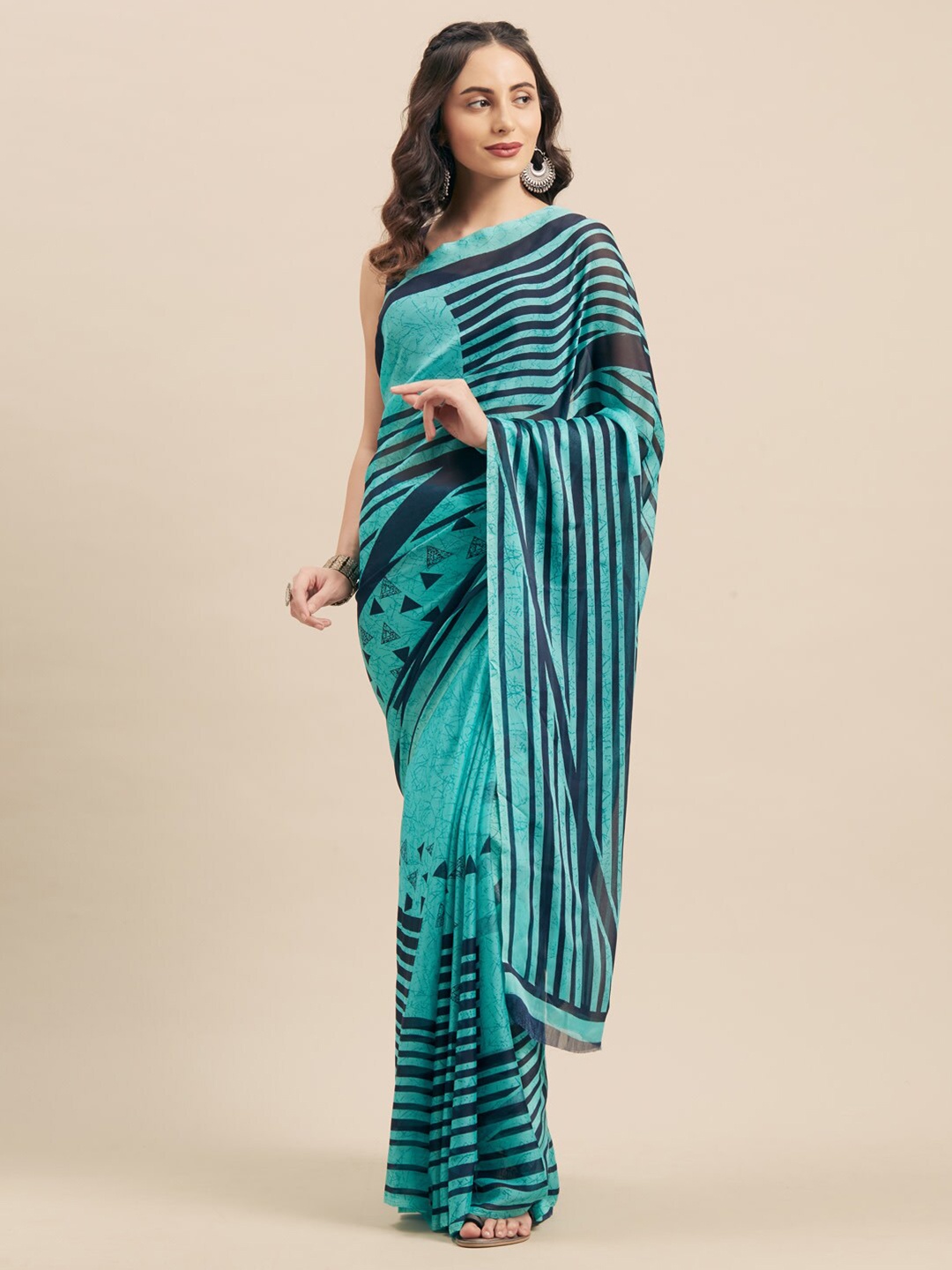 

Shaily Teal & Navy Blue Striped Poly Georgette Saree