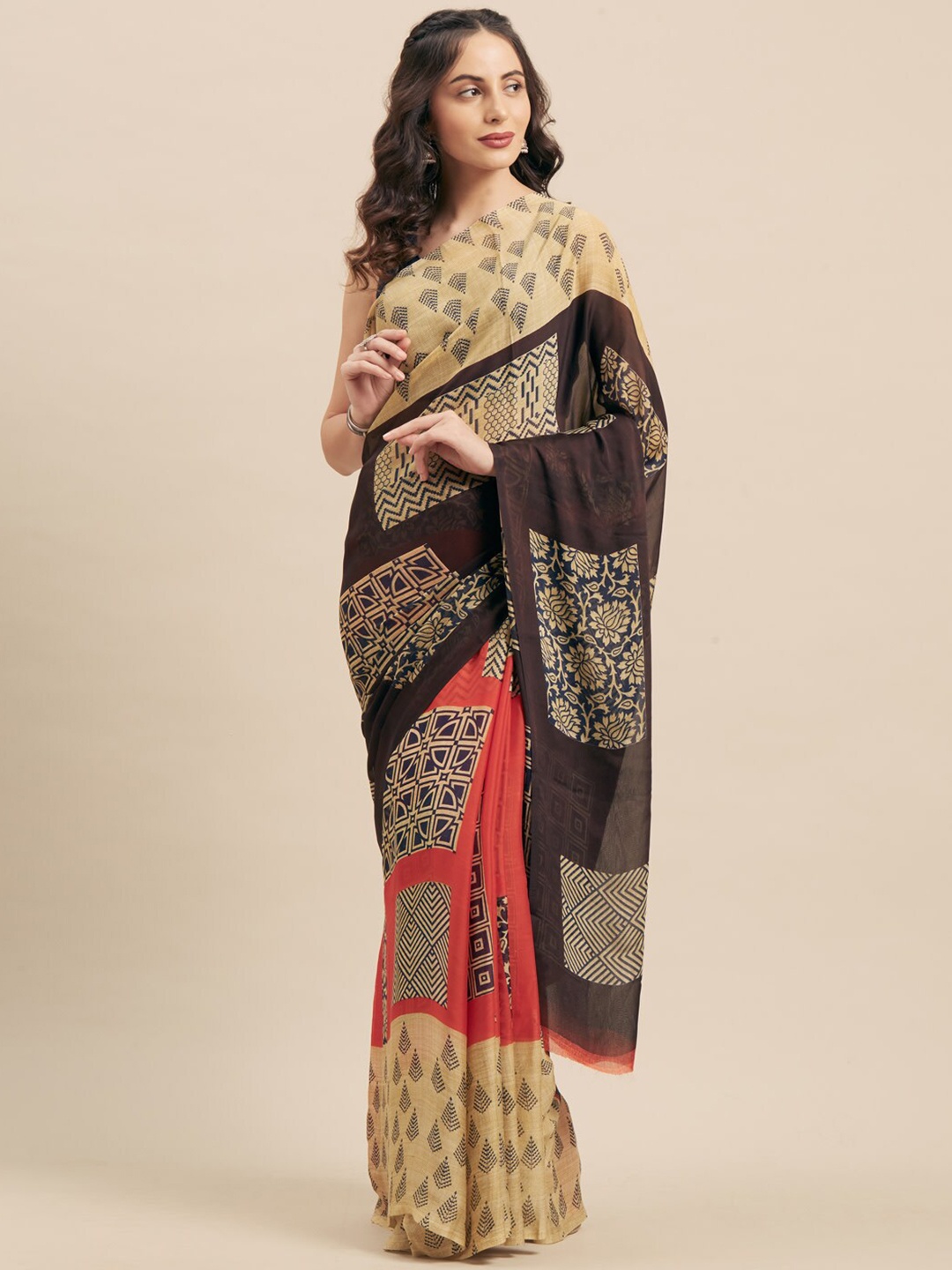 

Shaily Yellow & Brown Ethnic Motifs Saree