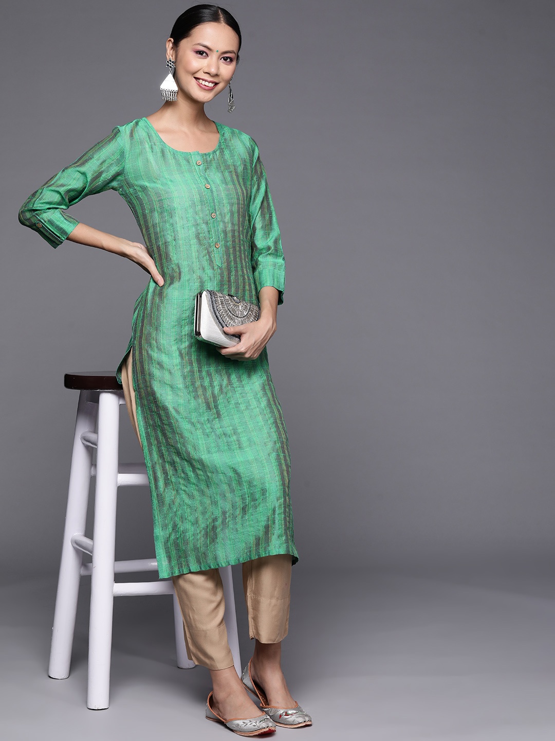 

Varanga Women Green Striped Kurta