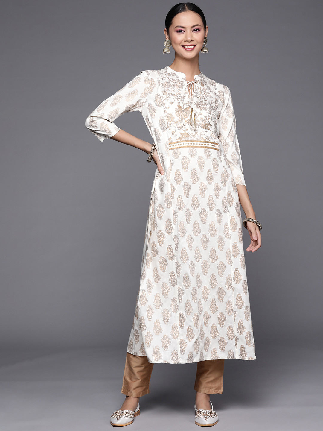 

Varanga Women Off White & Golden Ethnic Motifs Printed Kurta