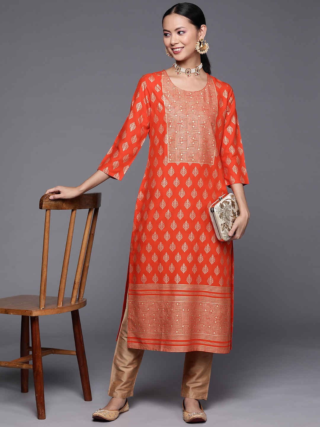 

Varanga Women Orange & Golden Ethnic Motifs Printed Kurta