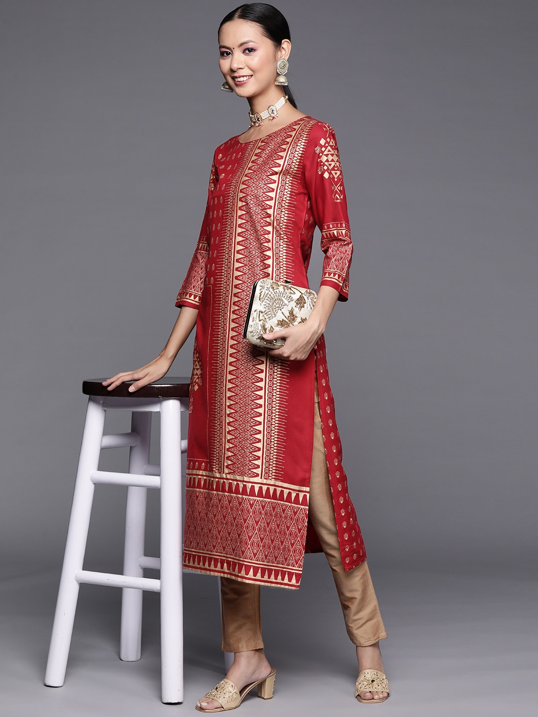 

Varanga Women Maroon & Golden Ethnic Motifs Printed Kurta