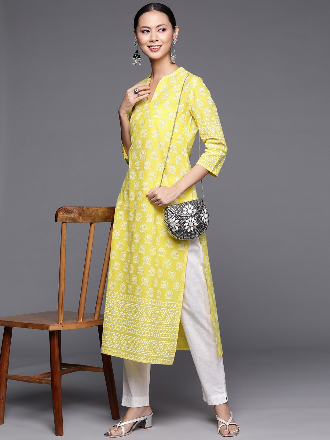 

Varanga Women Yellow & White Ethnic Motifs Printed Pure Cotton Kurta