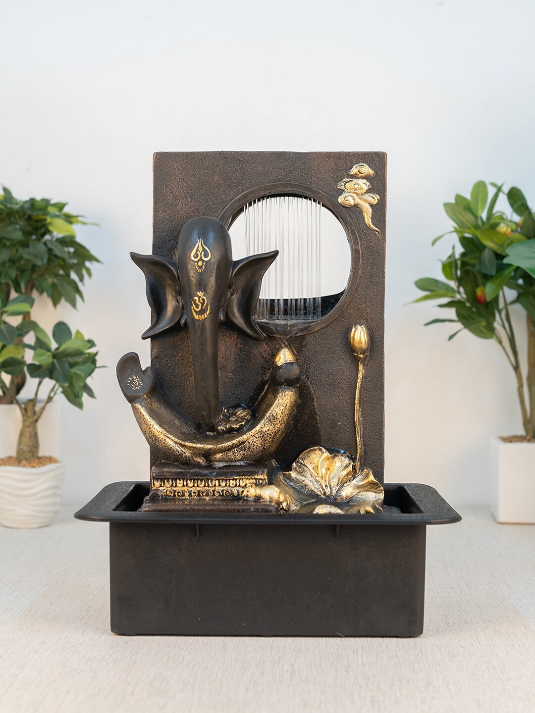 

HomeTown Gold-Toned & Black Modern Ganesha Water Fountain