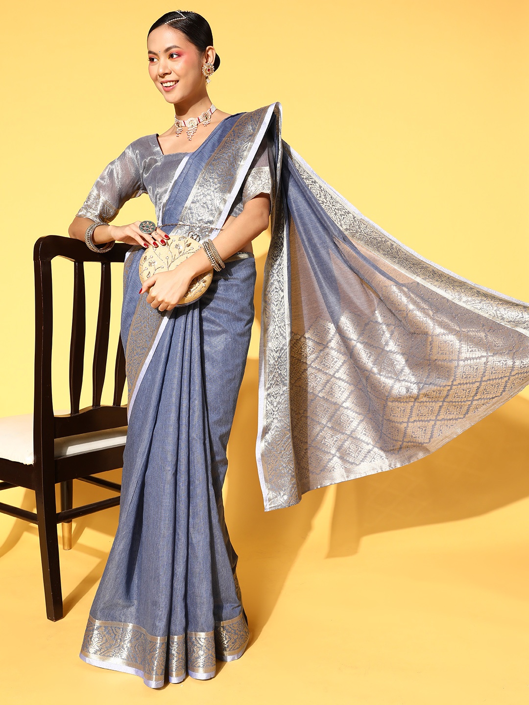 

Saree mall Ethnic Motifs Saree With Woven Design Border, Blue