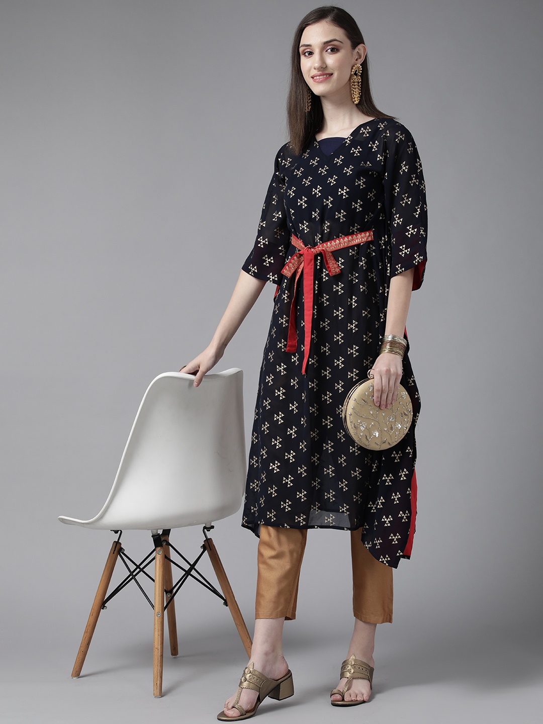 

Ahalyaa Women Navy Blue & Golden Printed Kaftan Kurta