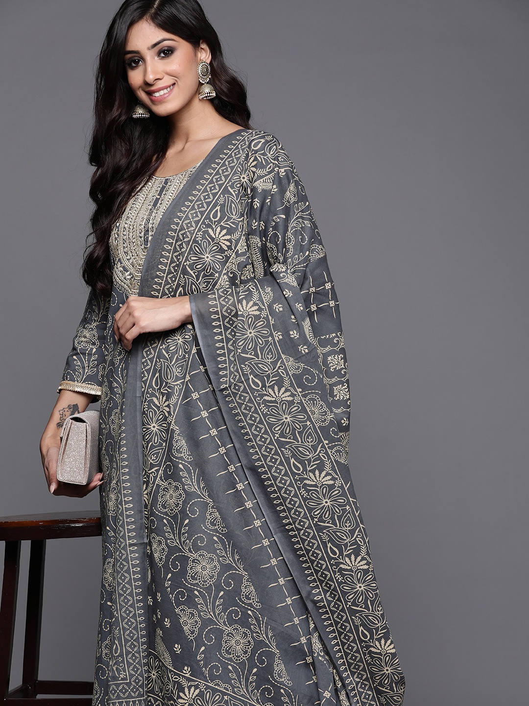 

Indo Era Women Grey Yoke Design Thread Work Kurta with Palazzos & With Dupatta