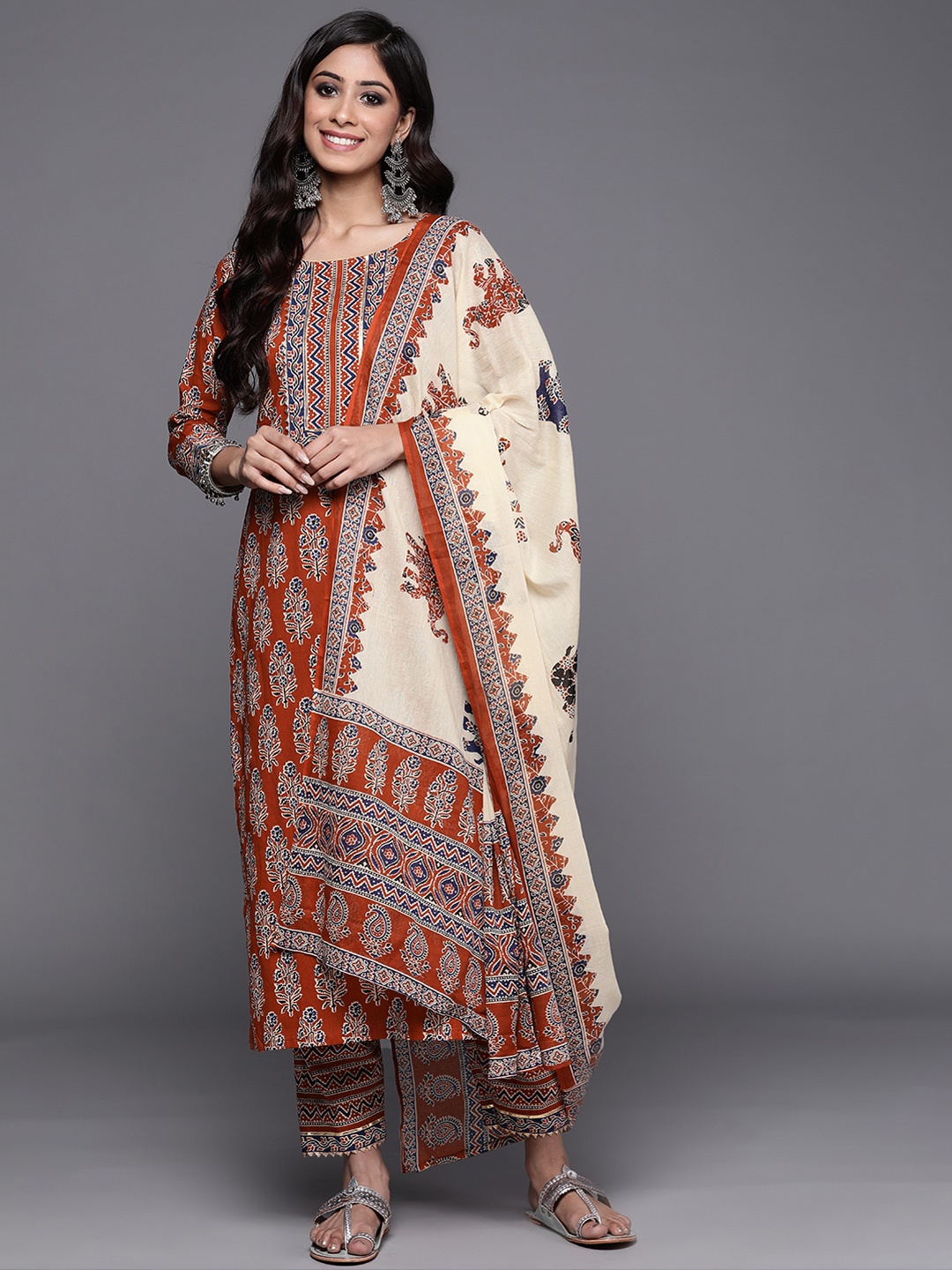 

Indo Era Women Rust Ethnic Motifs Printed Kurta with Palazzos & With Dupatta