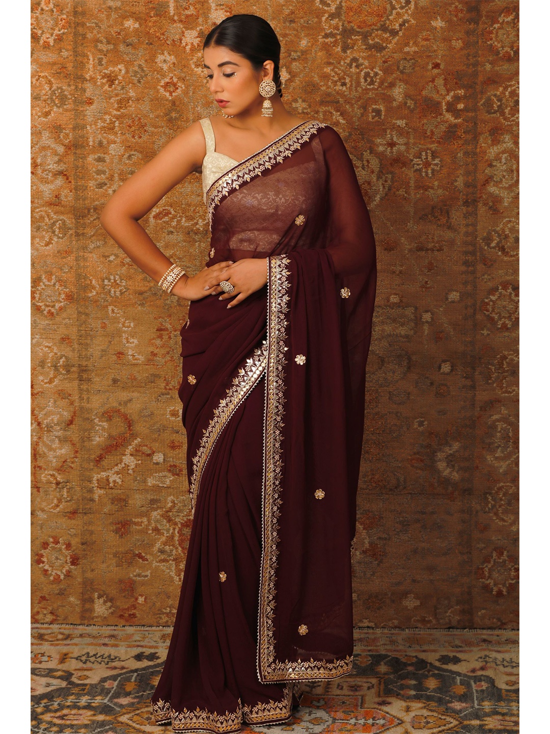 

Geroo Jaipur Burgundy & Silver-Toned Embellished Gotta Patti Pure Georgette Heavy Work Saree