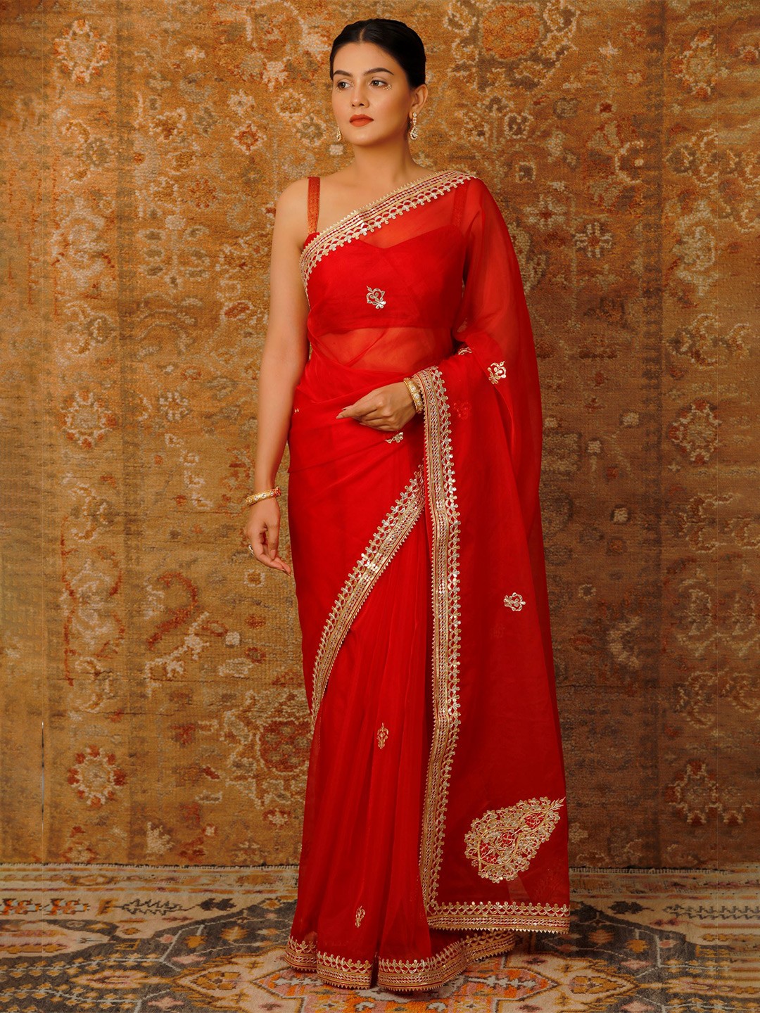 

Geroo Jaipur Red Handcrafted Gota Patti Organza Saree