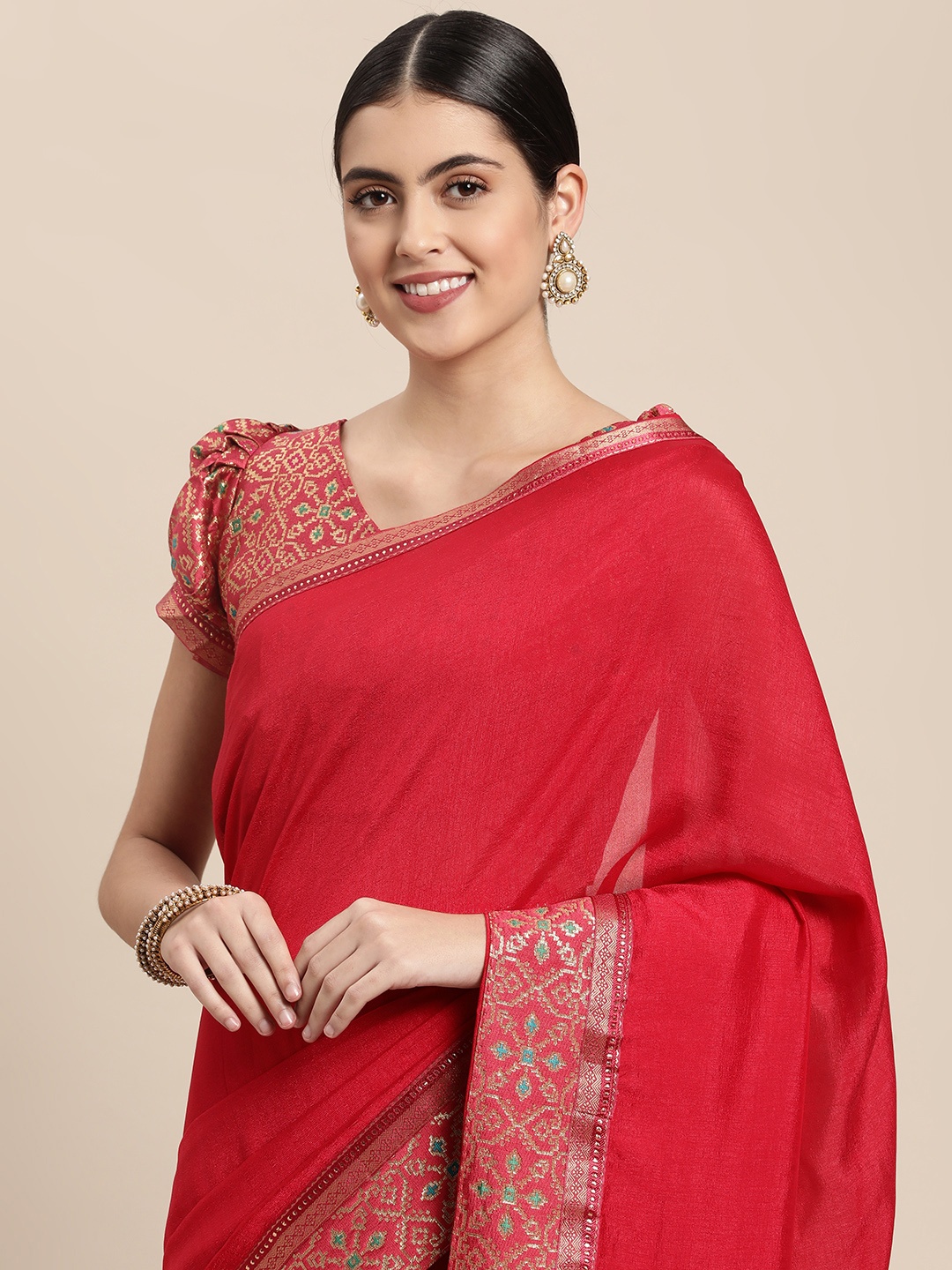 

Mitera Coral Red Solid Saree