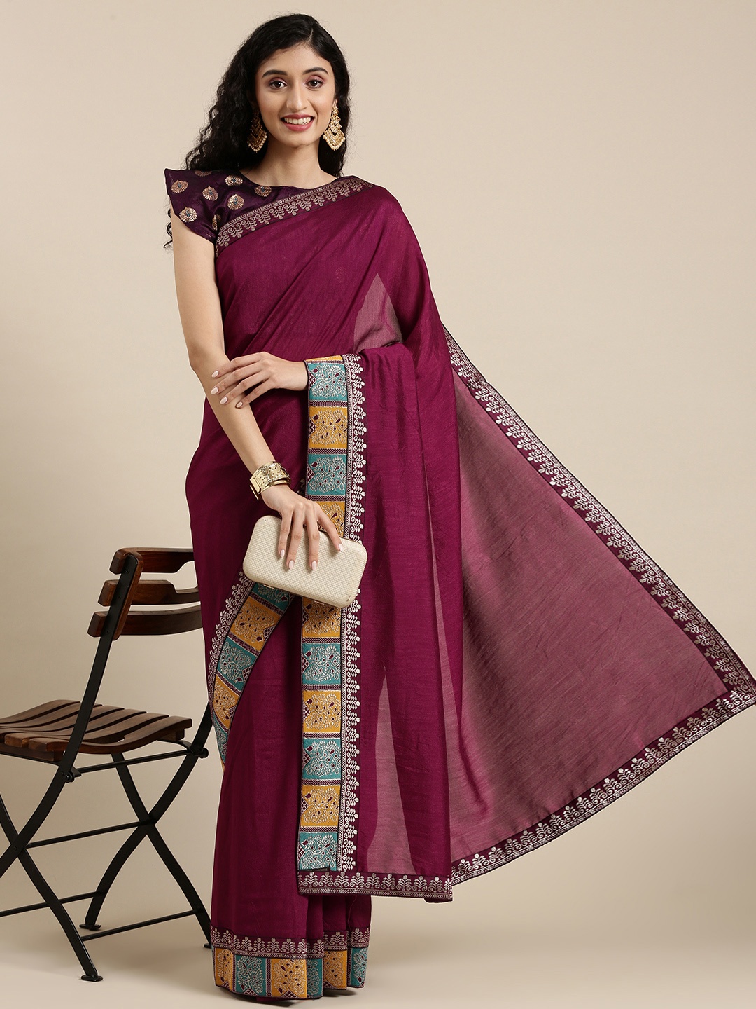 

Mitera Maroon & Yellow Silk Blend Saree