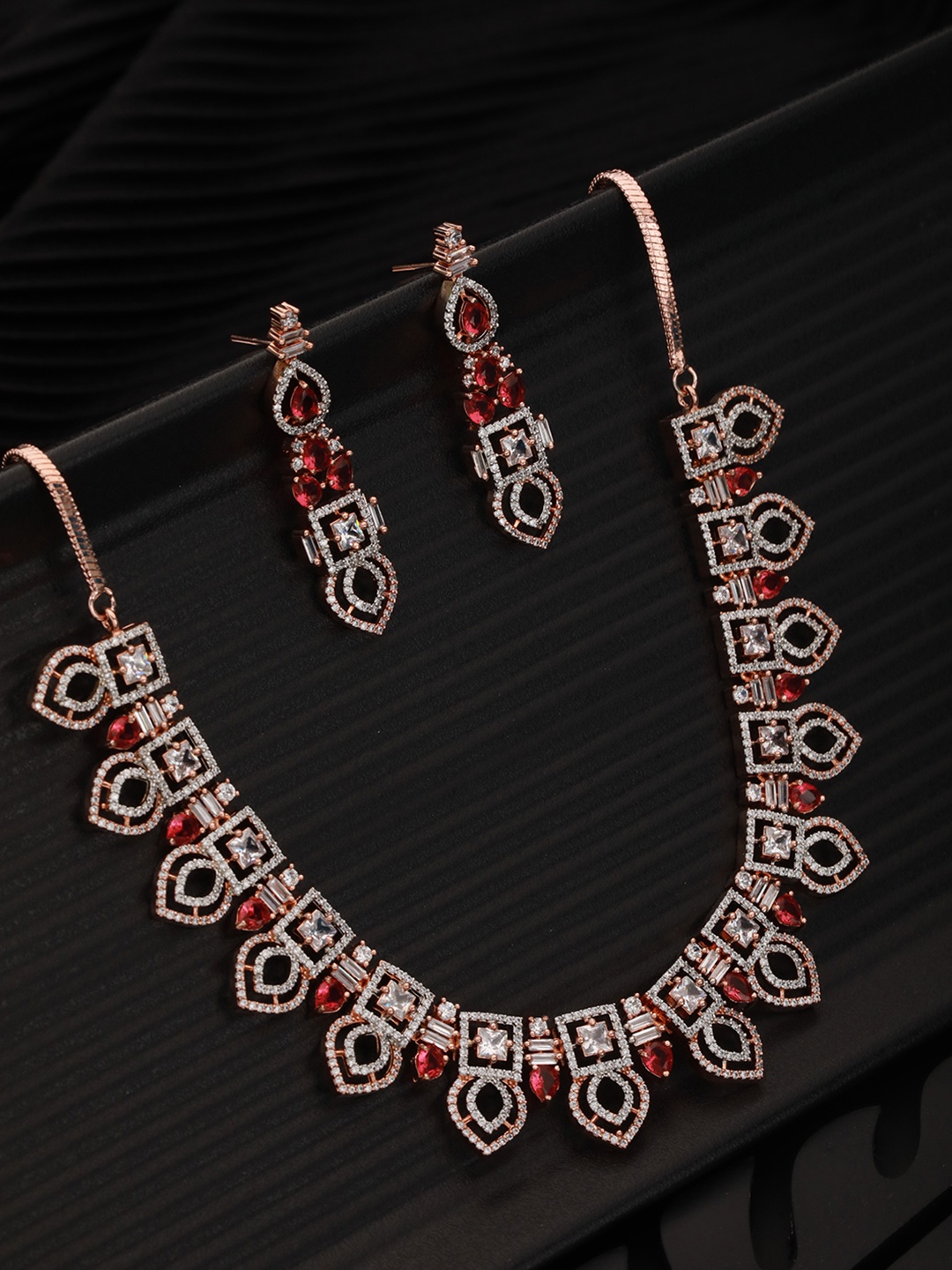 

Saraf RS Jewellery Rose Gold-Plated Red & White AD Studded Handcrafted Jewellery Set