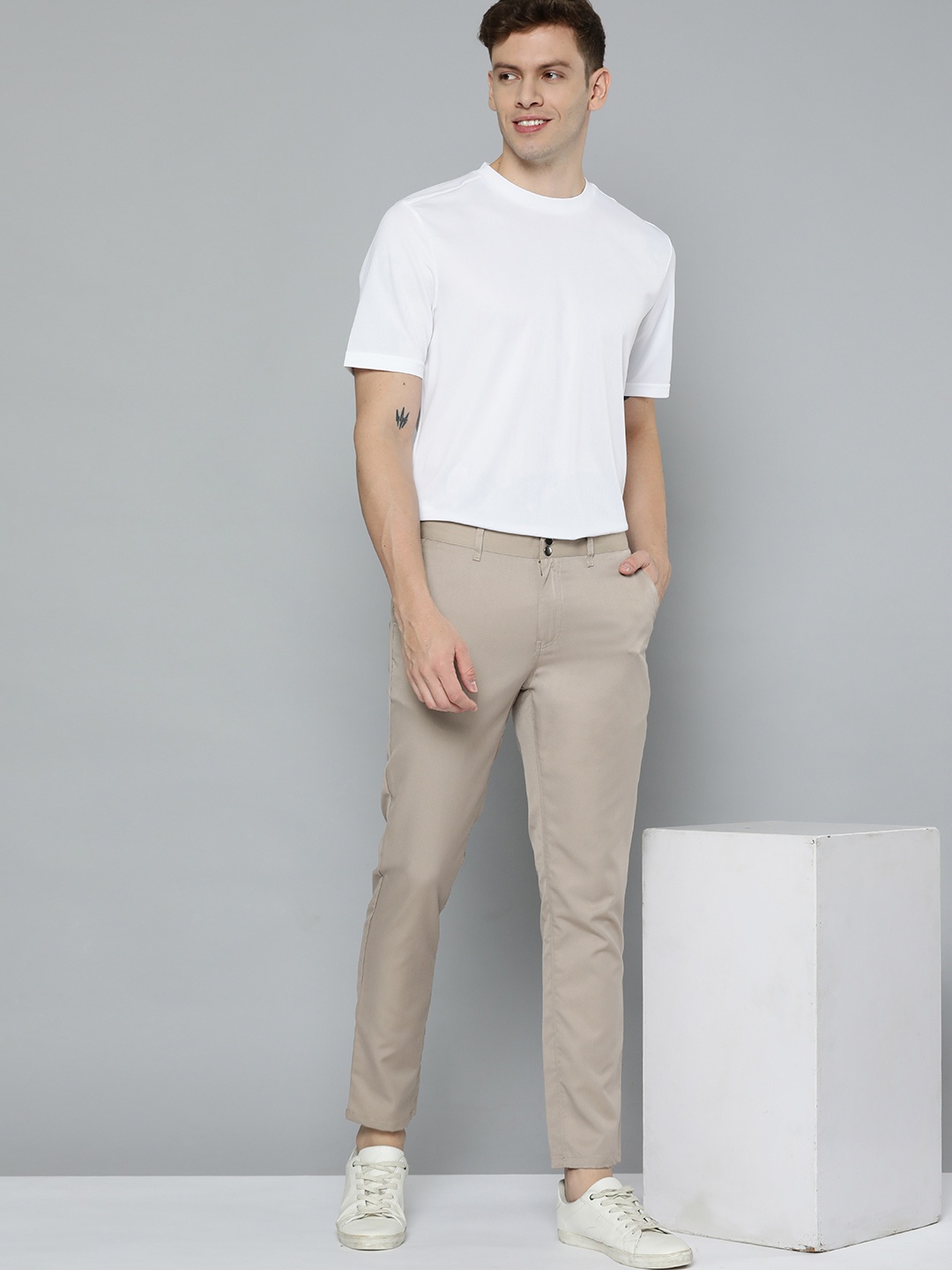 

Mast & Harbour Men Beige Solid Trousers