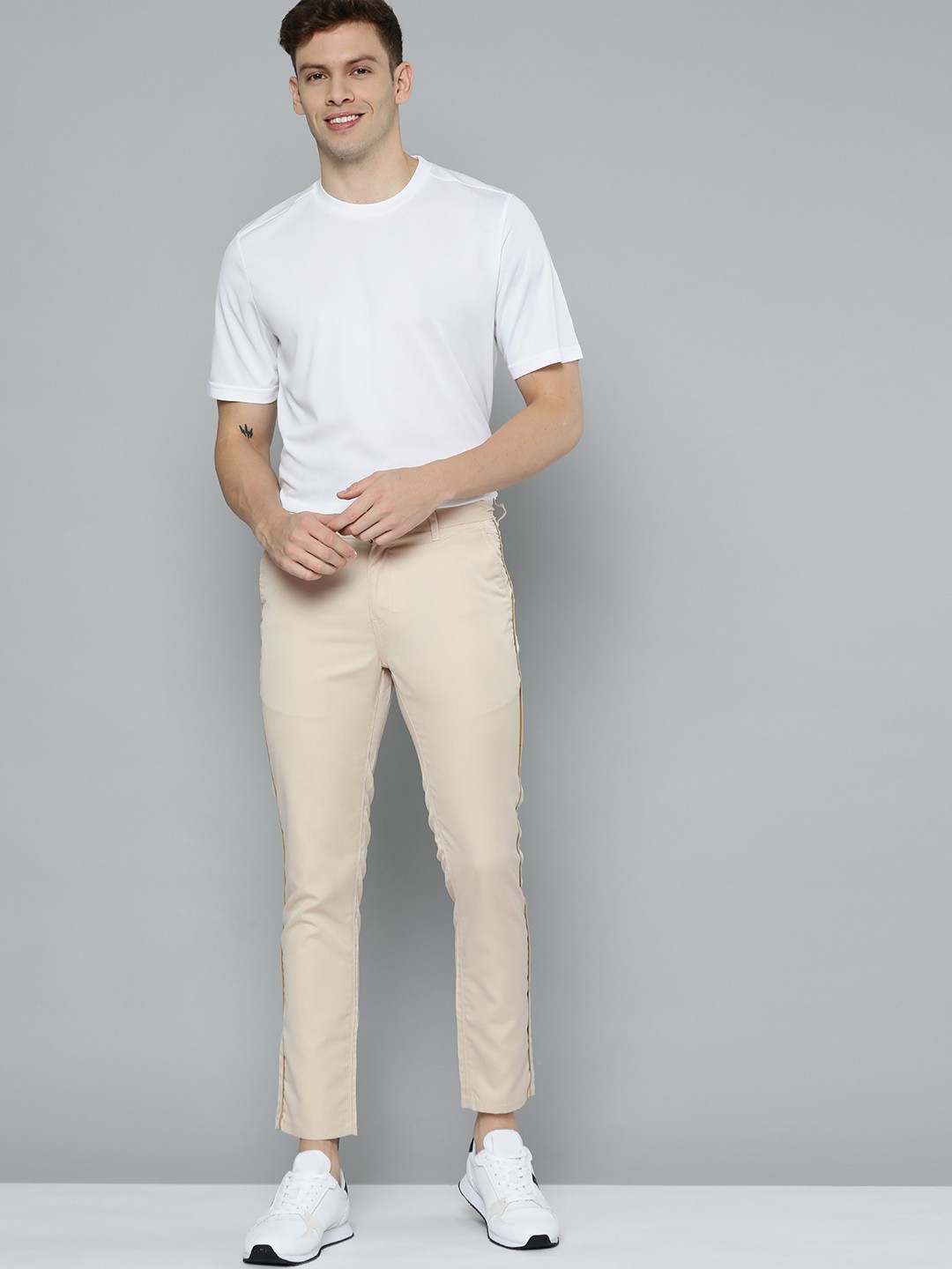 

Mast & Harbour Men Beige Solid Trousers