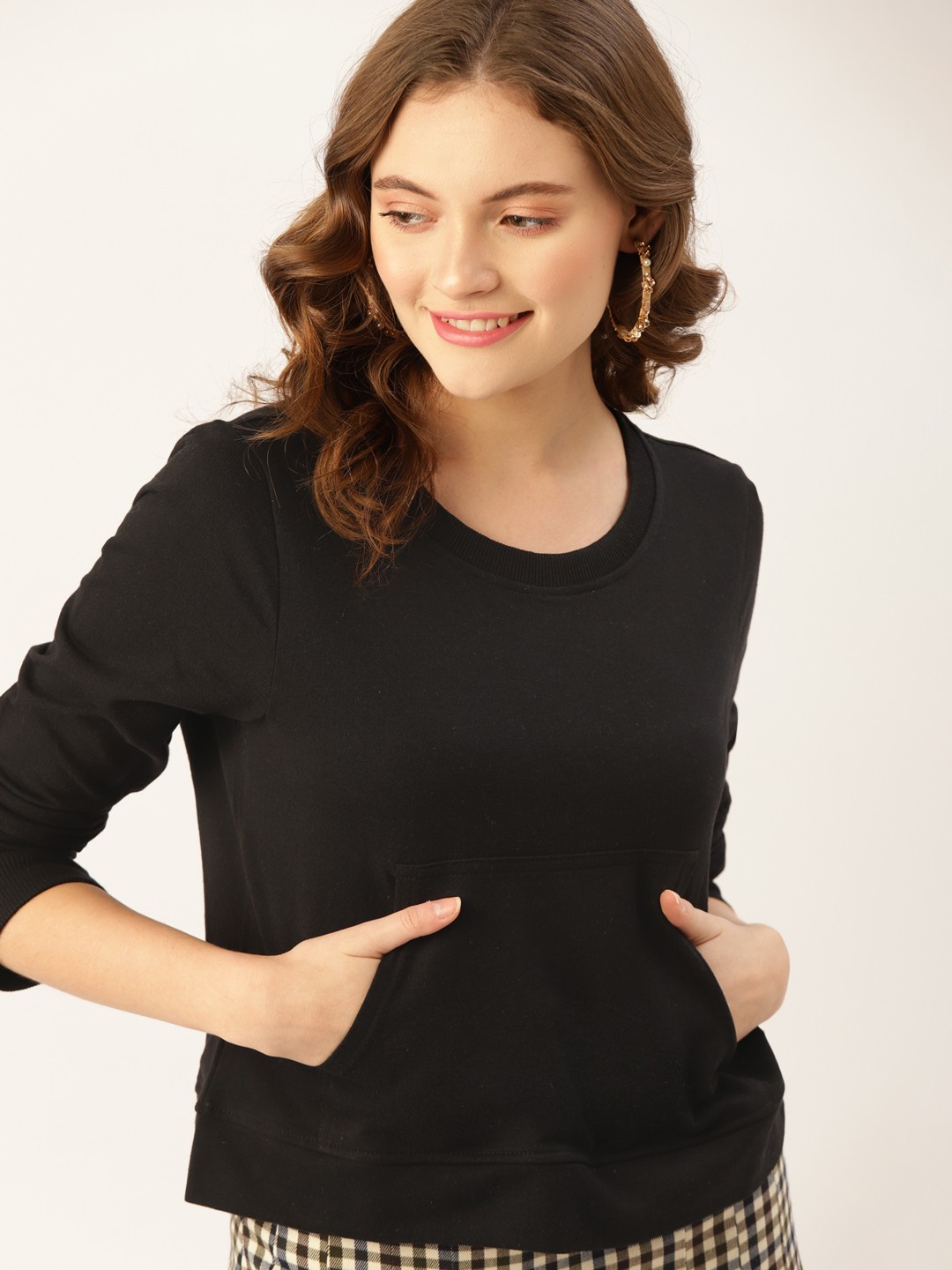 

DressBerry Women Black Solid Sweatshirt