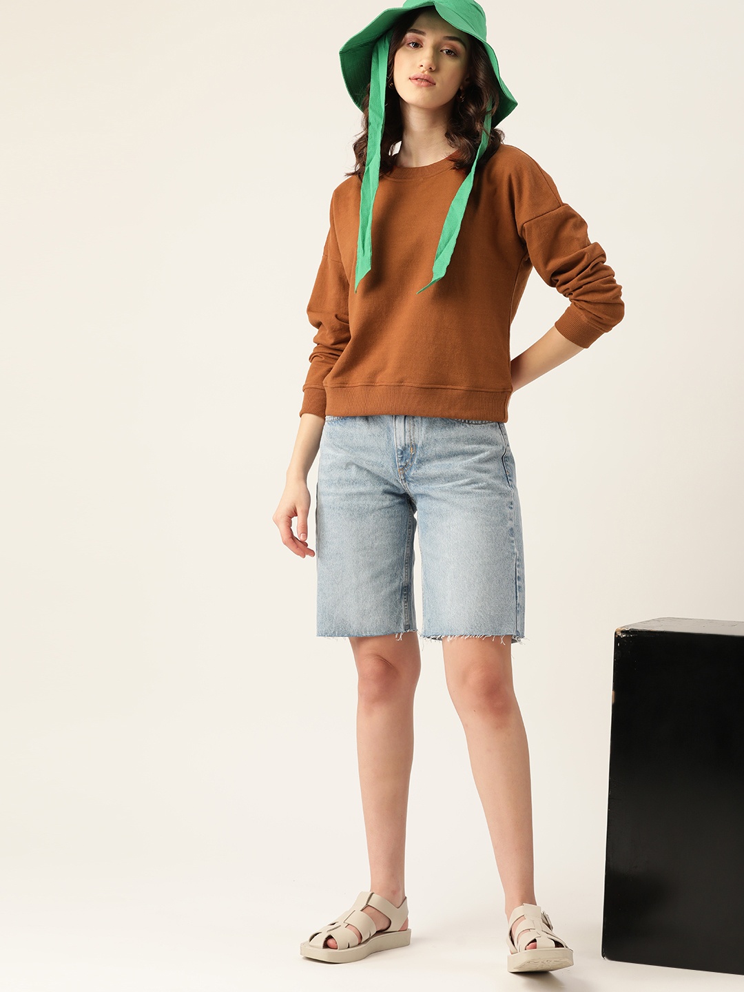 

DressBerry Women Brown Solid Drop-Shoulder Sleeves Sweatshirt