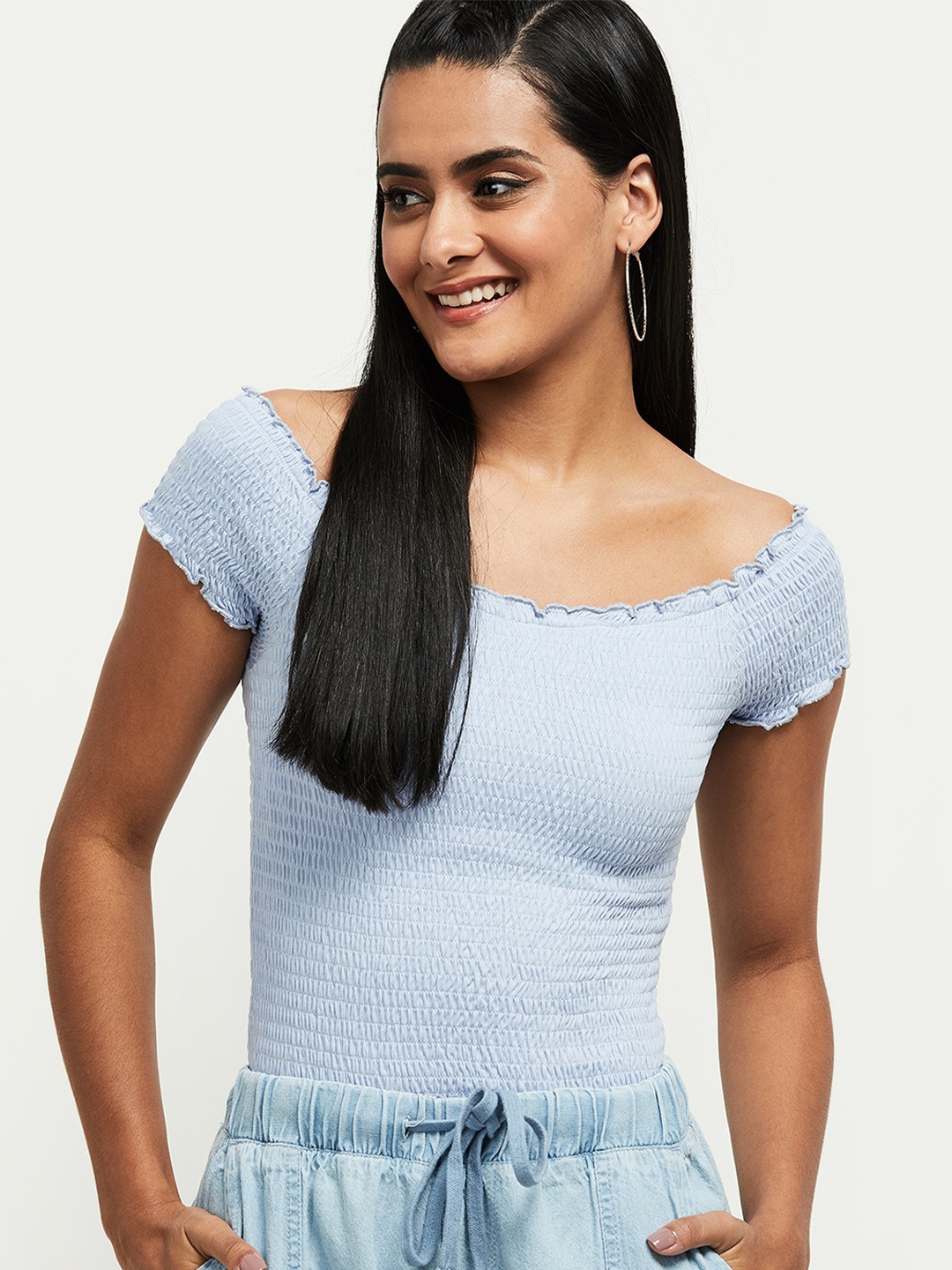 

max Light Blue Solid Smocked Top