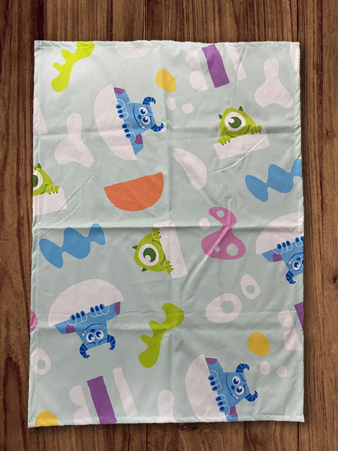

Disney Infant Blue & Green Printed Mattress Protector