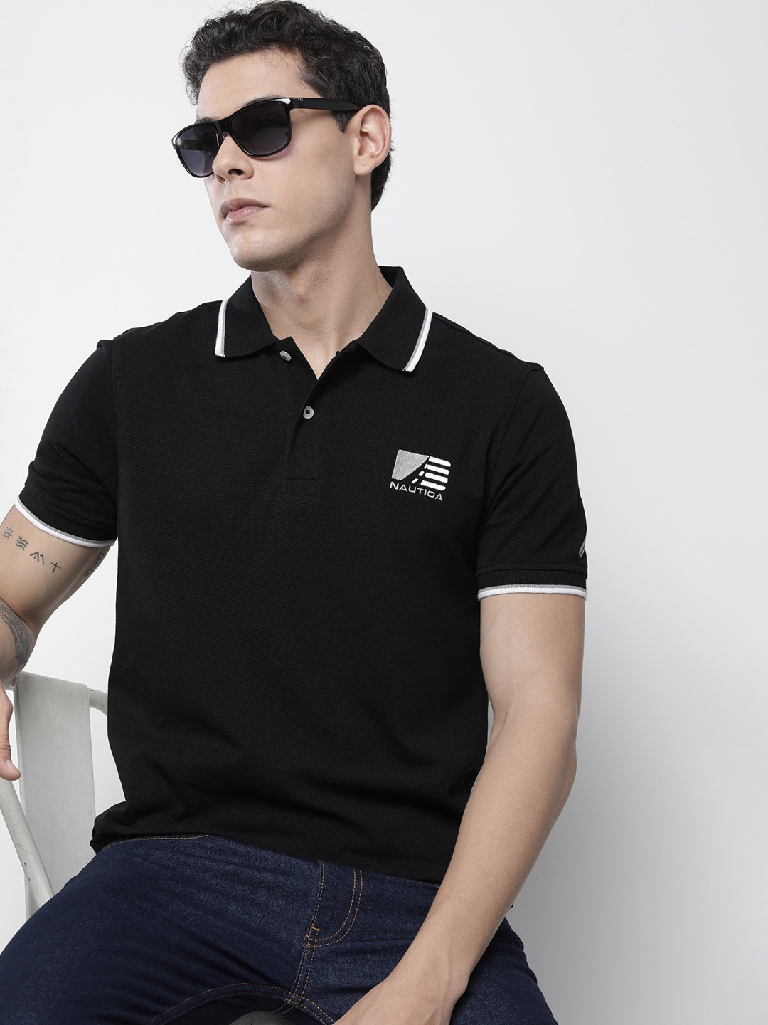 

Nautica Men Black Solid Polo Collar T-shirt