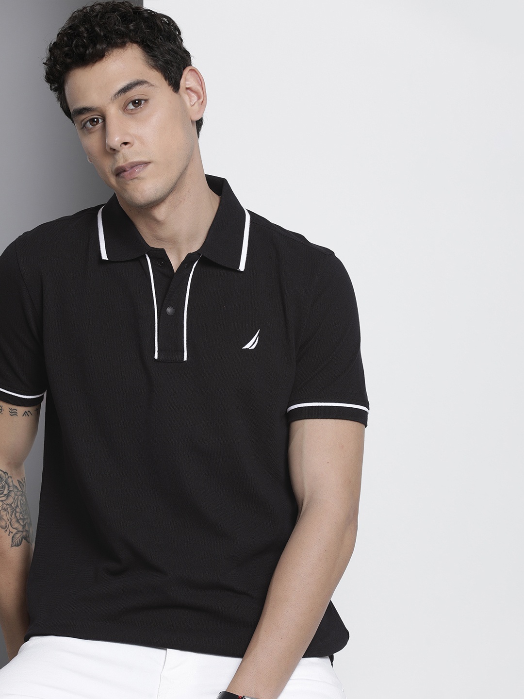 

Nautica Men Black Solid Pure Cotton Polo Collar T-shirt