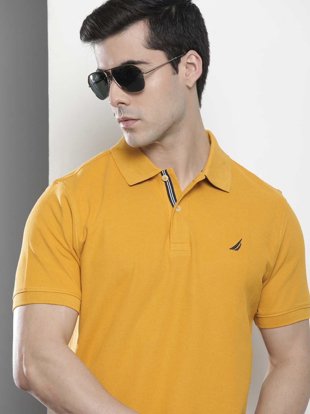 

Nautica Men Mustard Yellow Solid Pure Cotton Polo Collar T-shirt