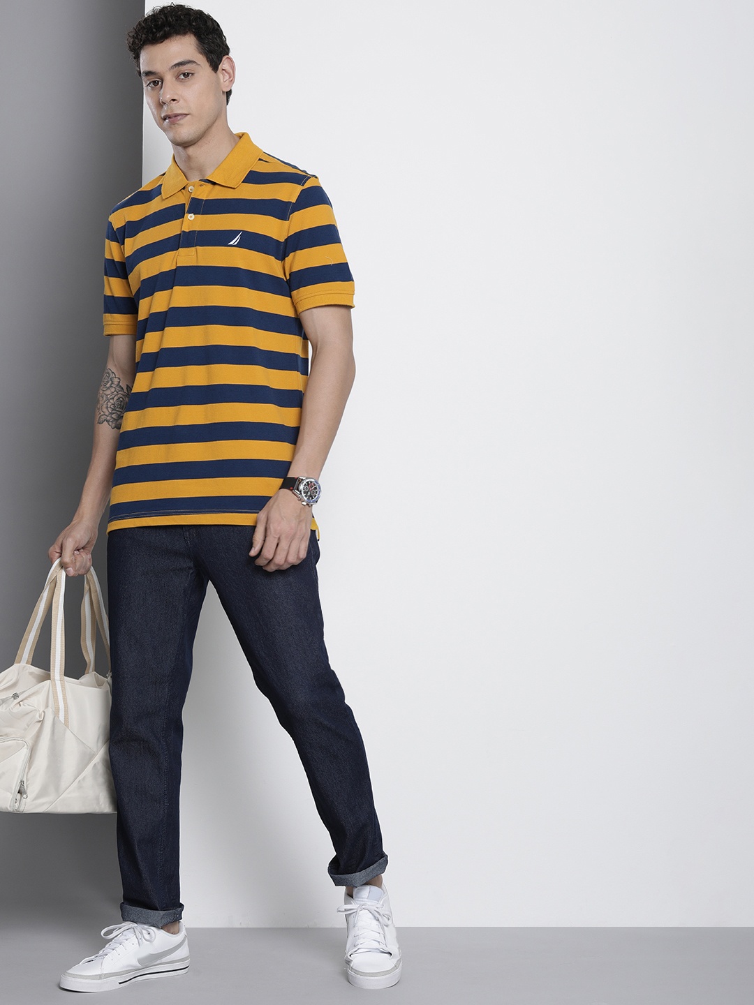 

Nautica Men Yellow & Navy Blue Striped Pure Cotton Polo Collar T-shirt