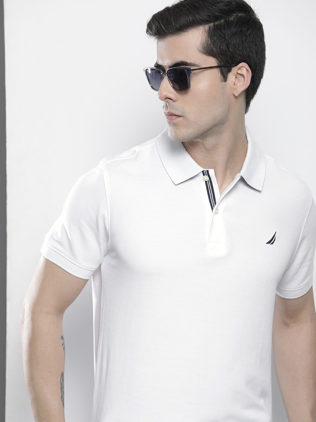 

Nautica Men White Solid Polo Collar Pure Cotton T-shirt