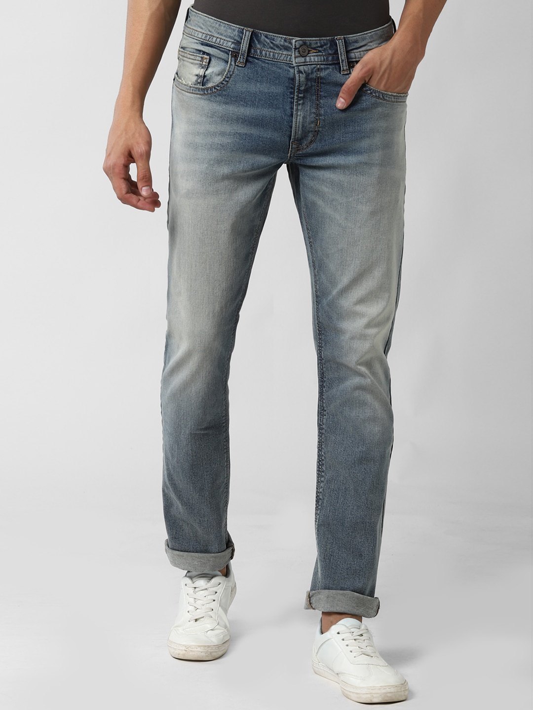 

Peter England Casuals Men Blue Slim Fit Heavy Fade Stretchable Jeans