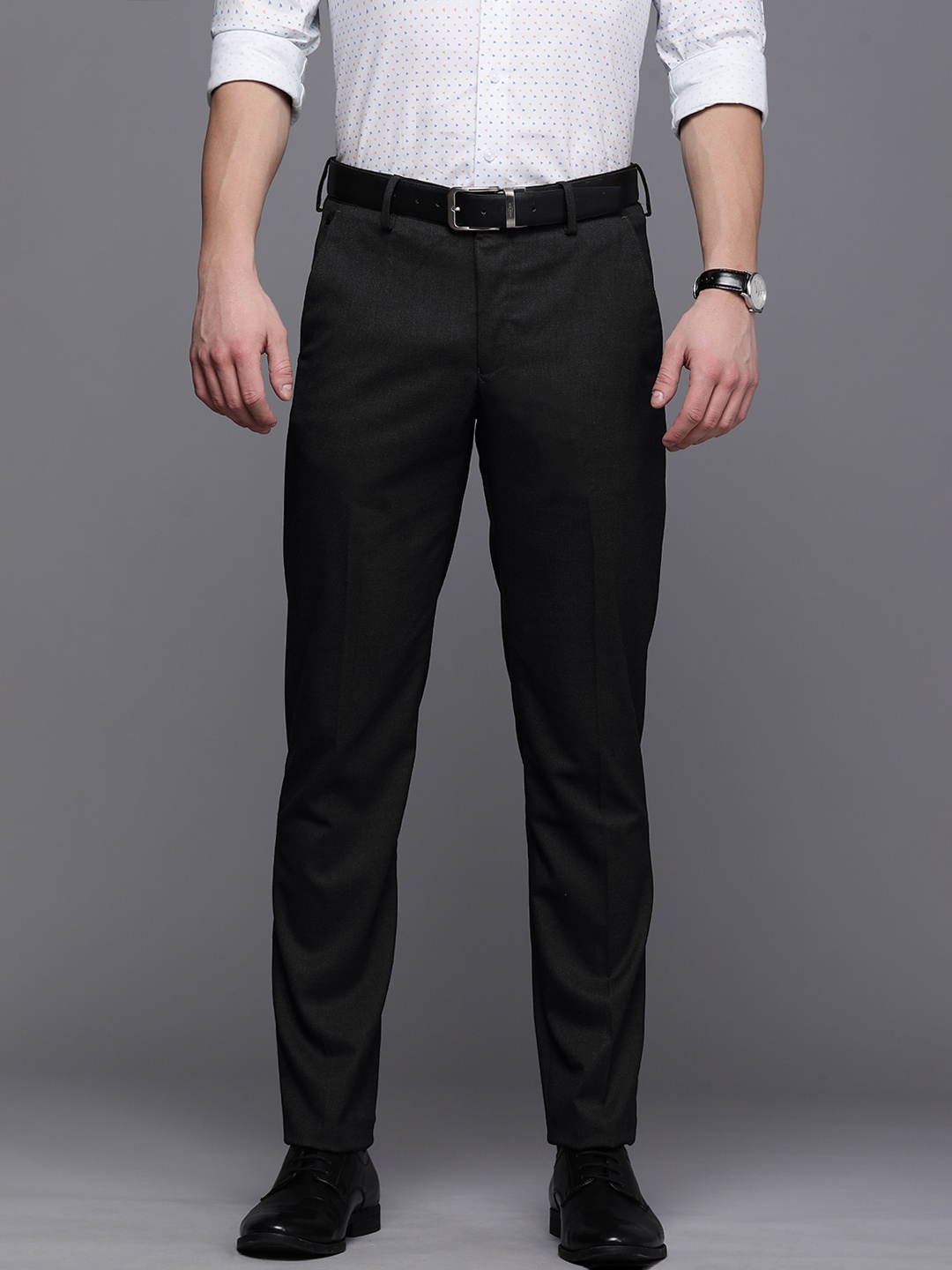 

Louis Philippe Men Black Textured Mid Rise Slim Fit Trousers