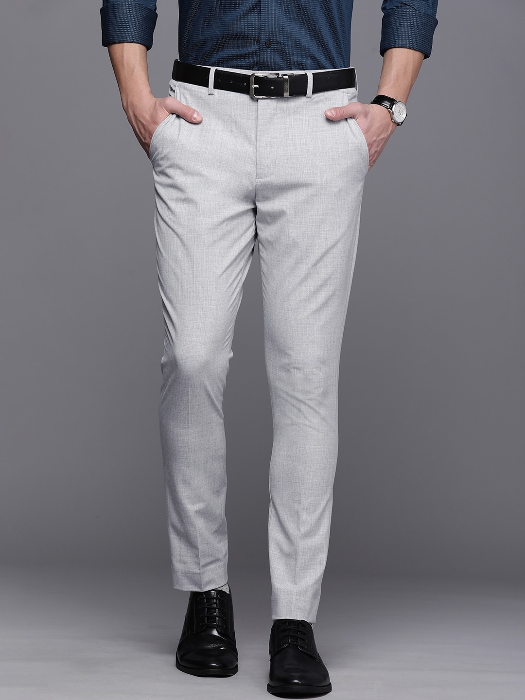 

Louis Philippe Men Grey Self Design Carrot Slim Fit MId-Rise Formal Trousers