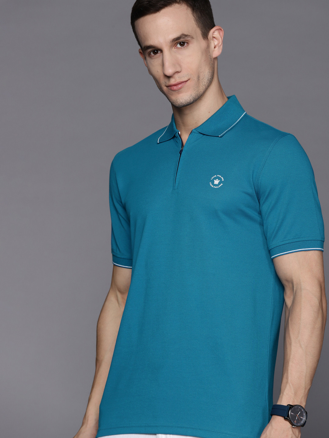 

Louis Philippe Men Blue Brand Logo Polo Collar T-shirt